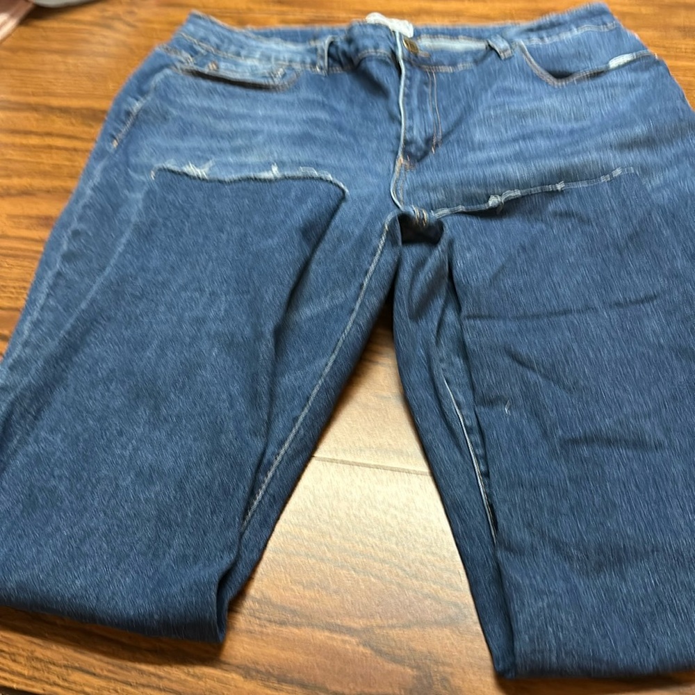 Honey & Bristle premium denim jeans with frayed bottoms
